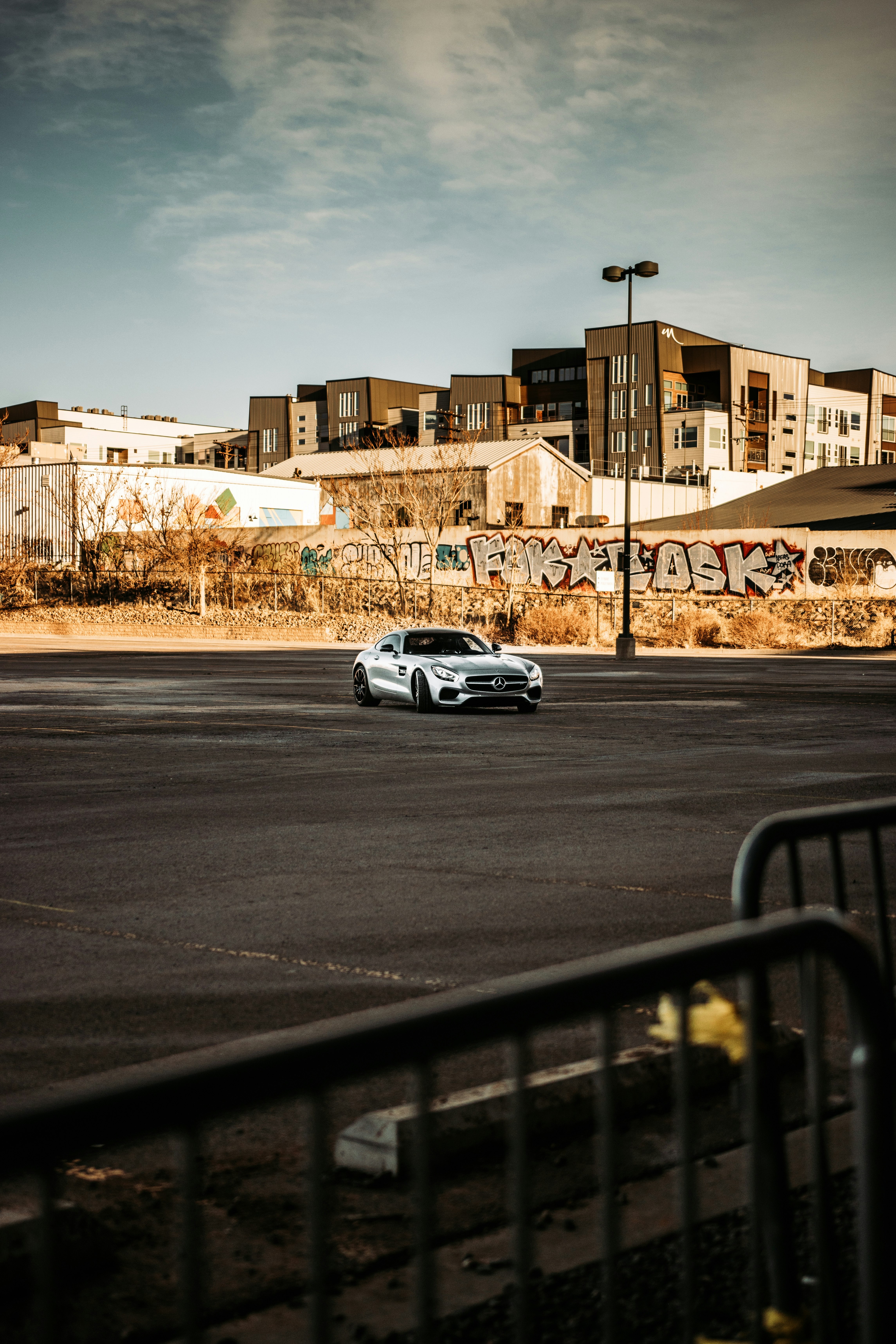 silver sedan on road during daytime